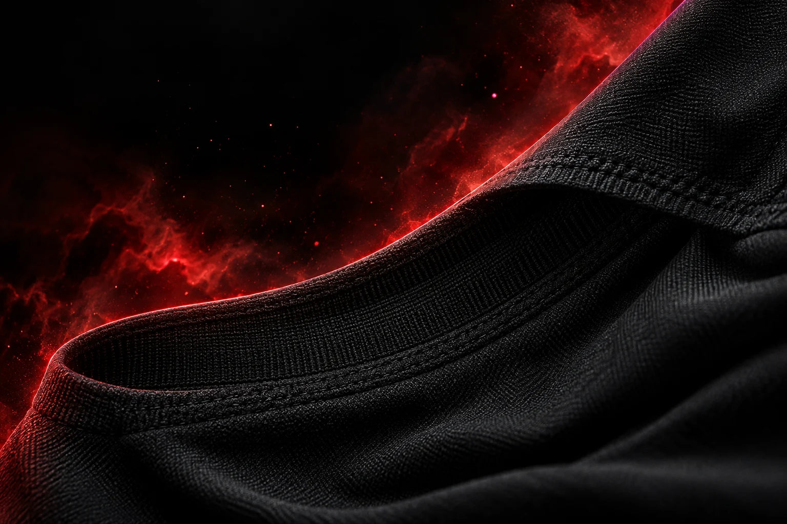 Illustration de principe : texture noire de l’élastique KORBIT à la base du rashguard